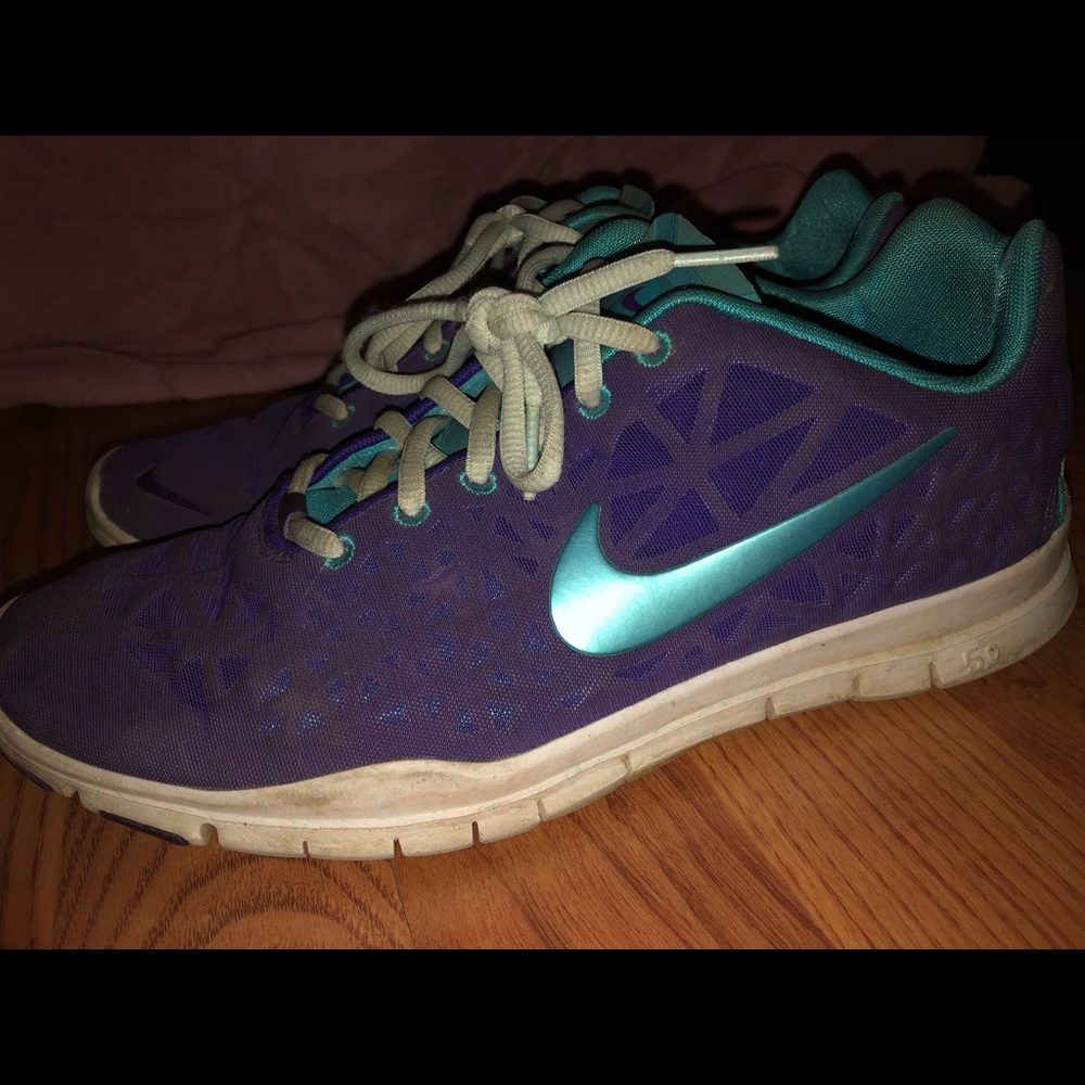 Purple and blue Nike running shoes
